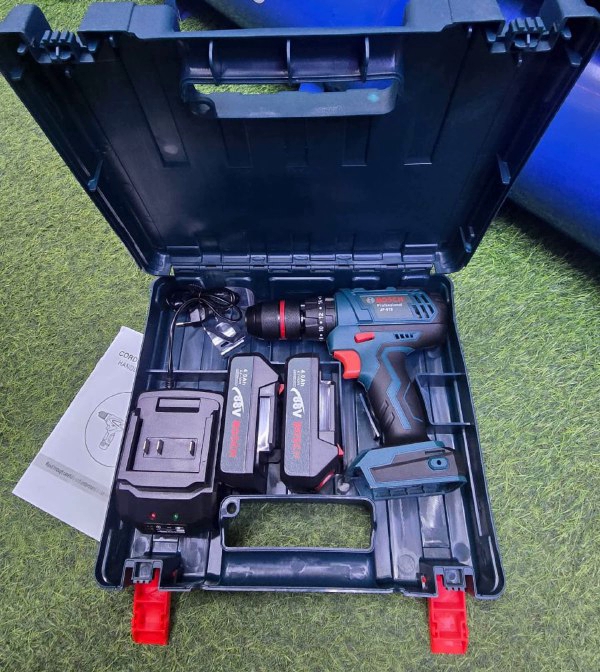 900bc94b-e228-4bbd-a18e-aef3e88c59ca Bosch Cordless drill with hammer function set - Image 1