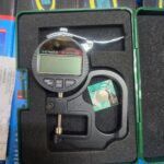 Portable digital thickness gauge.