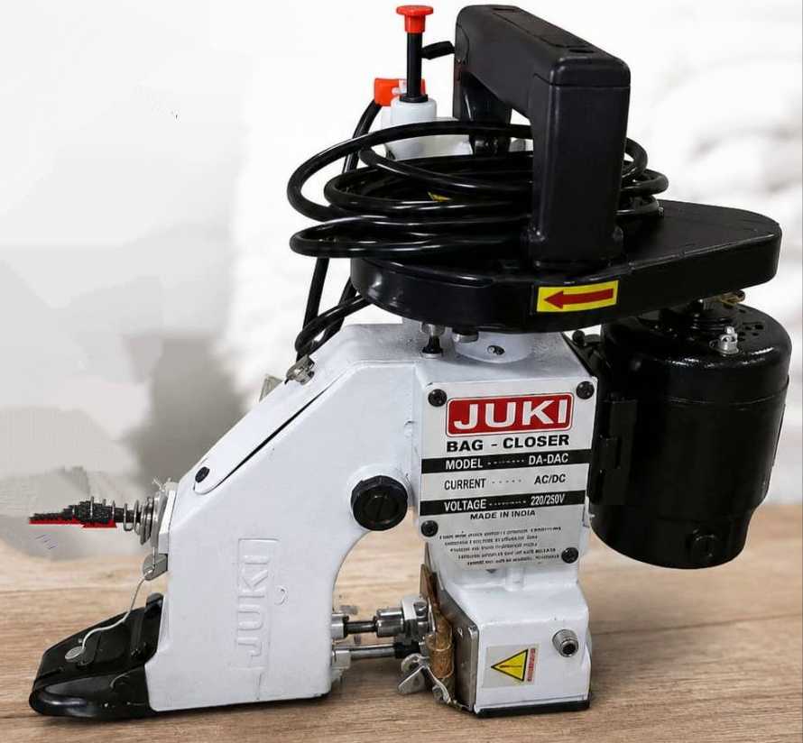 3e7bbebf-2c8e-401d-bb2d-03c27accf556 Portable Juki DA-DAC bag closer machine - Image 1